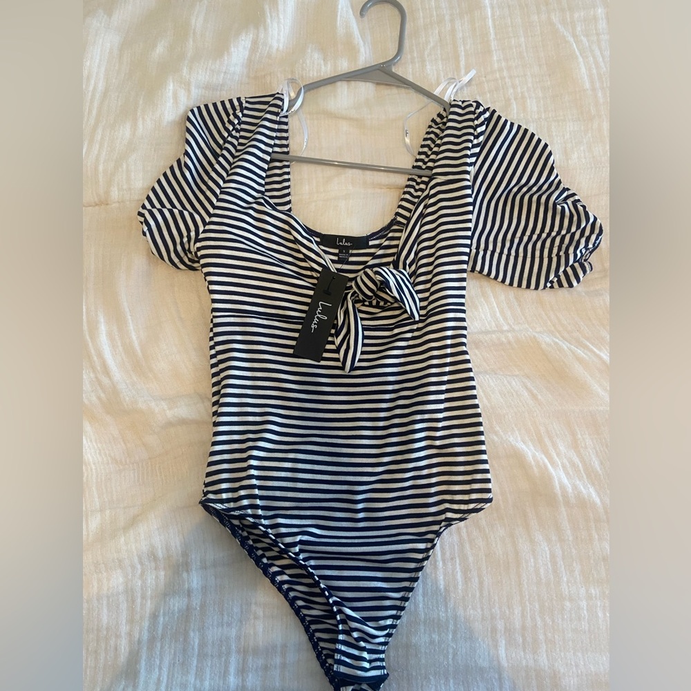 NWT Lulu’s Tie Fidelity Navy Blue and White Striped
Tie-Front Bodysuit - Picture 6 of 10